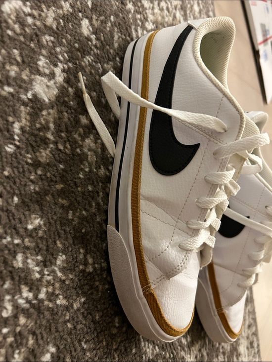 Nike White Sneakers with Black Swoosh and Gold Accent main image 4